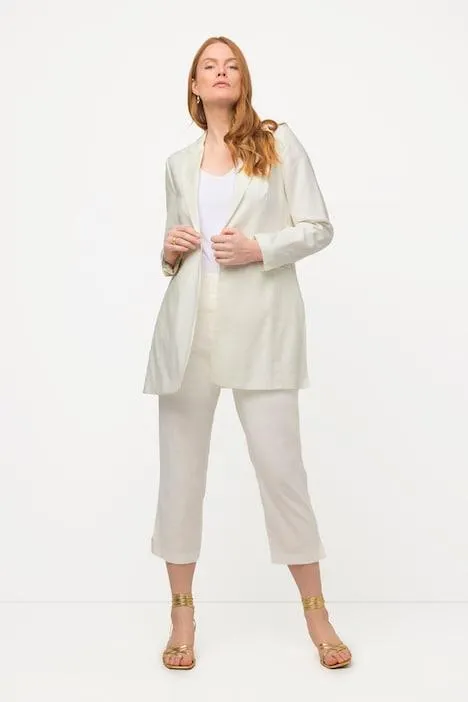 Blazer long en lin. Col à revers. Fente sur le côté.