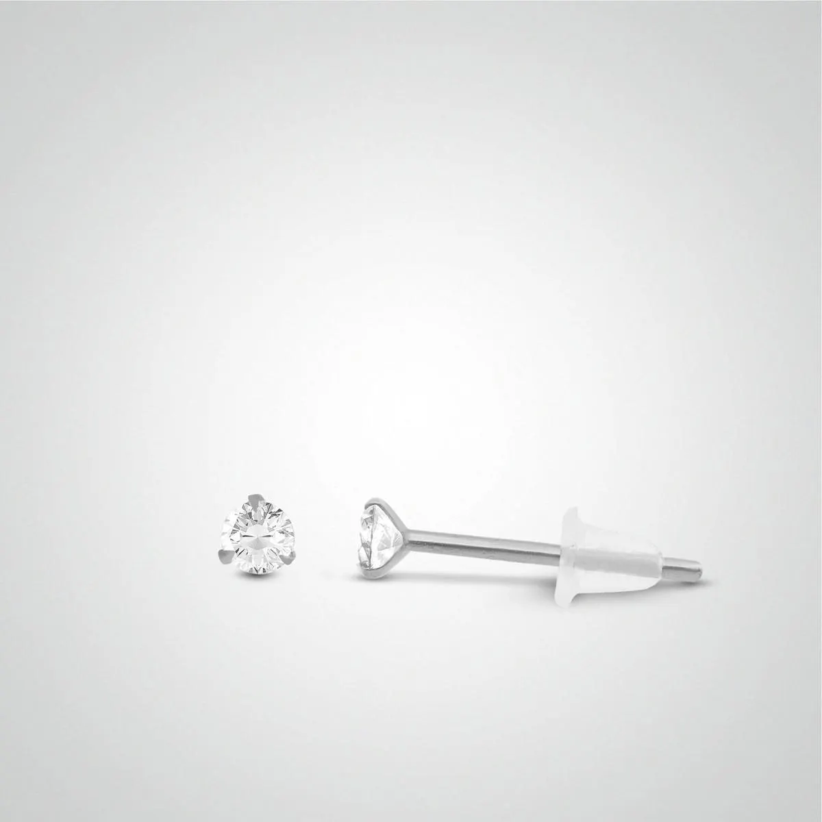 Boucle d'oreille en or blanc avec zircon blanc de 5mm (vendue à l'unité/non à la paire)