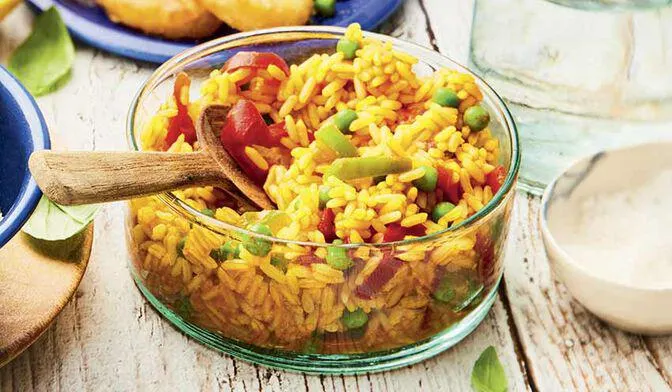 Riz cuisiné à l'espagnole (poivrons, petits pois)