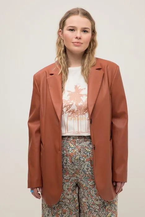 Blazer à coupe ample et col à revers. Manches longues et aspect cuir