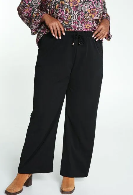 Long pantalon uni avec ceinture smockée