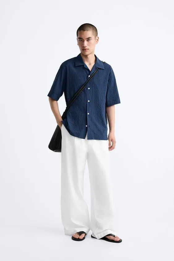 PLEATED WIDE FIT PANTS