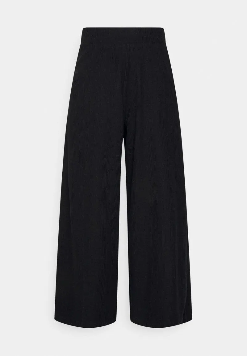 Pantalones - black