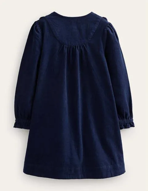 Robe festonnée en velours côtelé