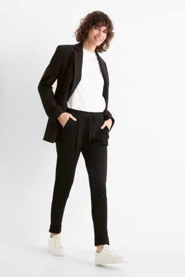 Jersey trousers - mid-rise waist - tapered fit