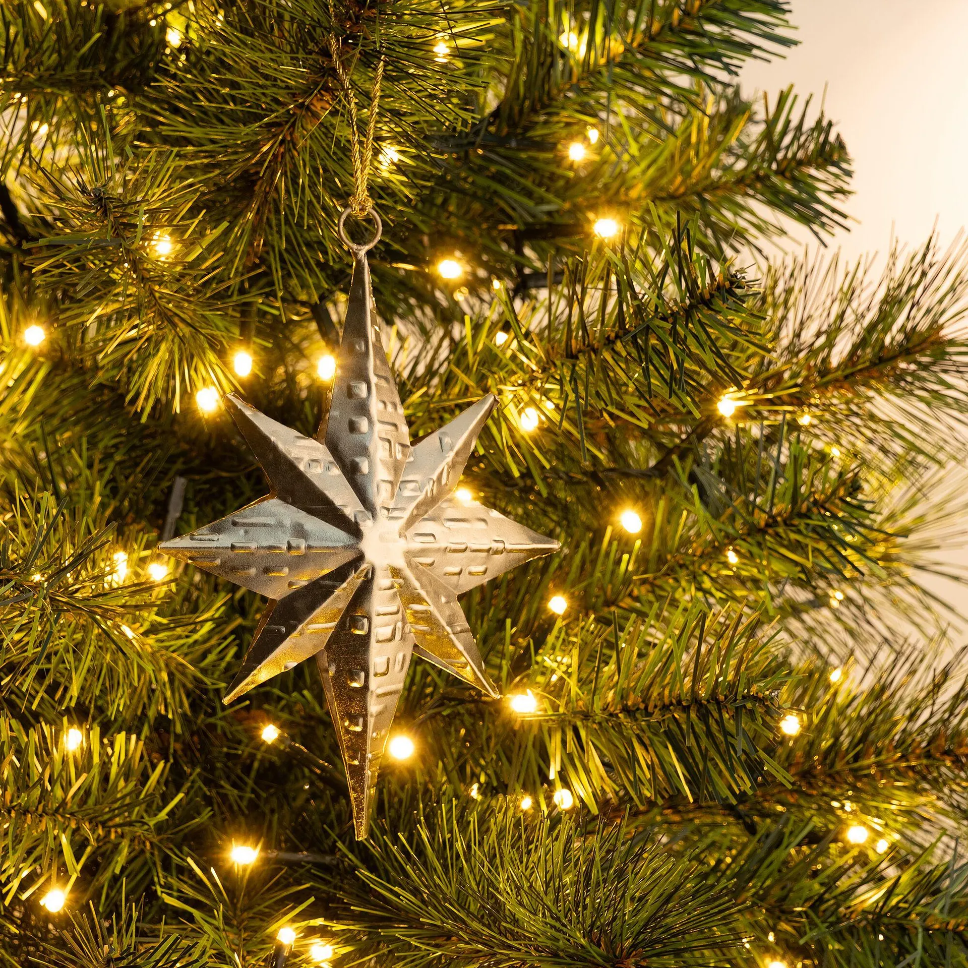 Suspension de Noël étoile métallisée H17cm - doré