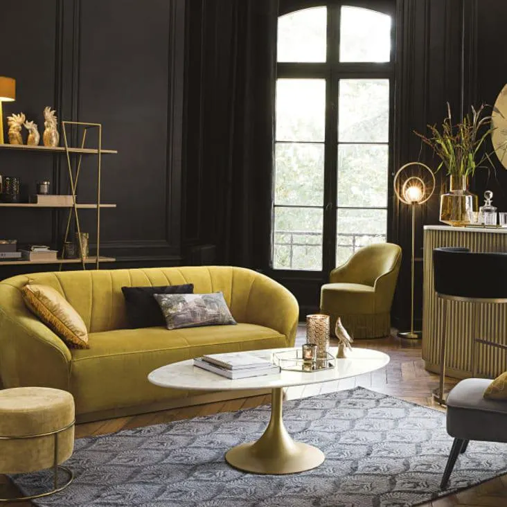 Puf de terciopelo amarillo y metal dorado