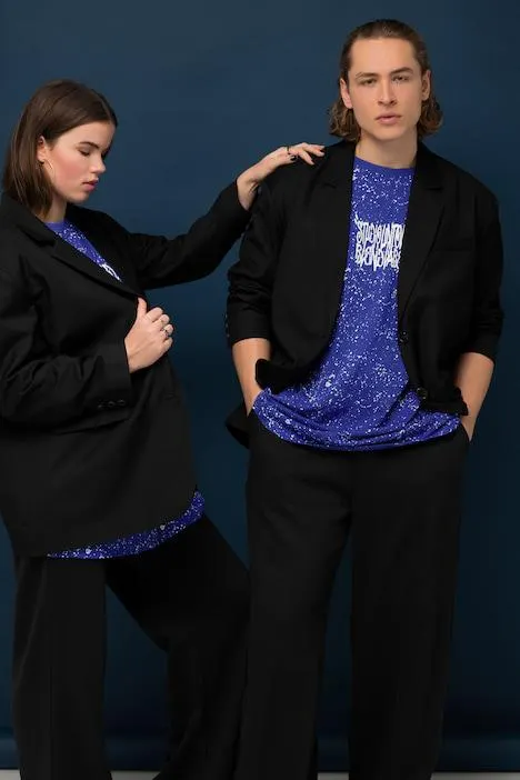 Blazer oversized unisexe à manches longues. Revers. Patte de boutonnage dans le dos