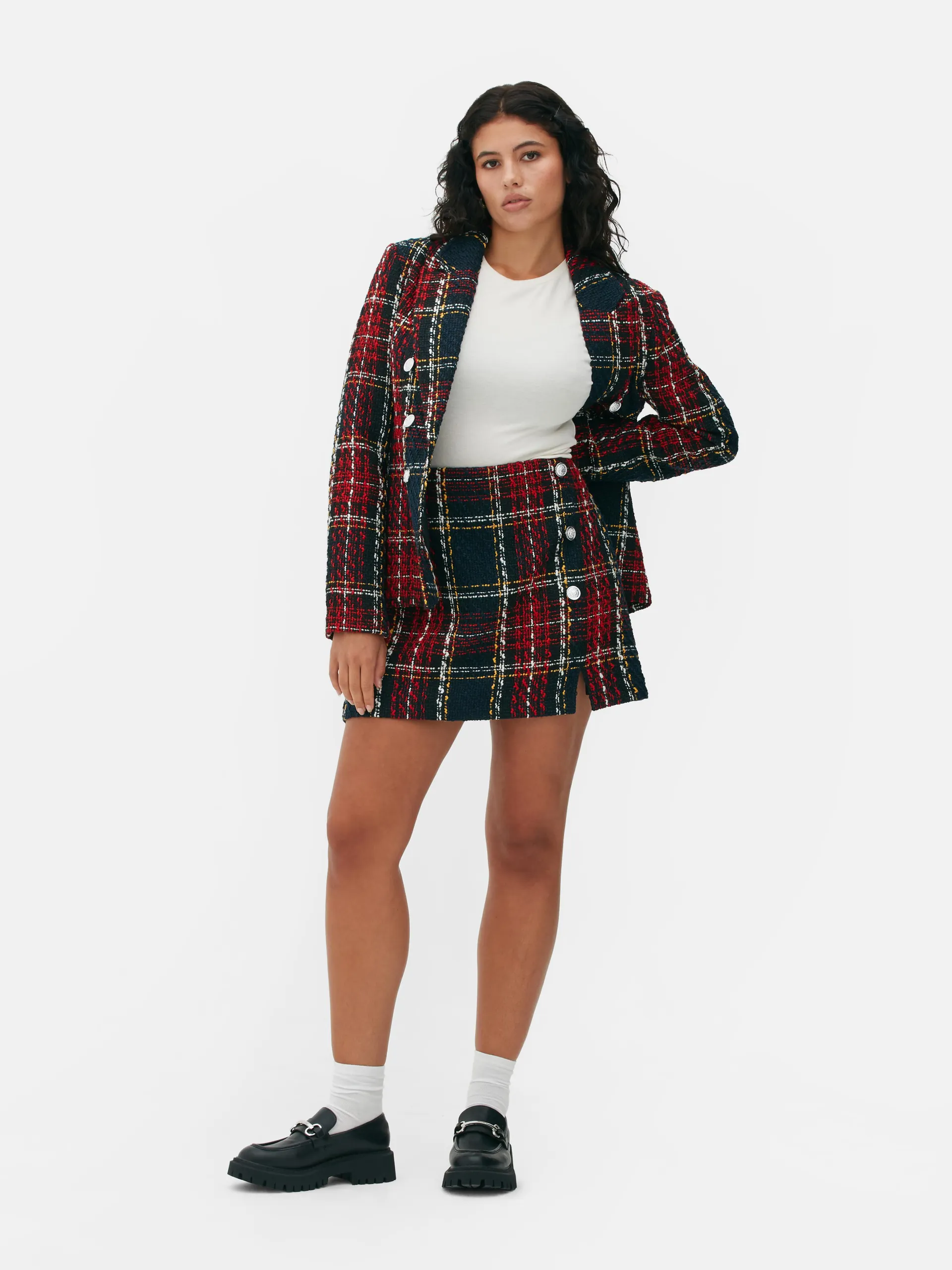 Minigonna in bouclé con motivo scozzese