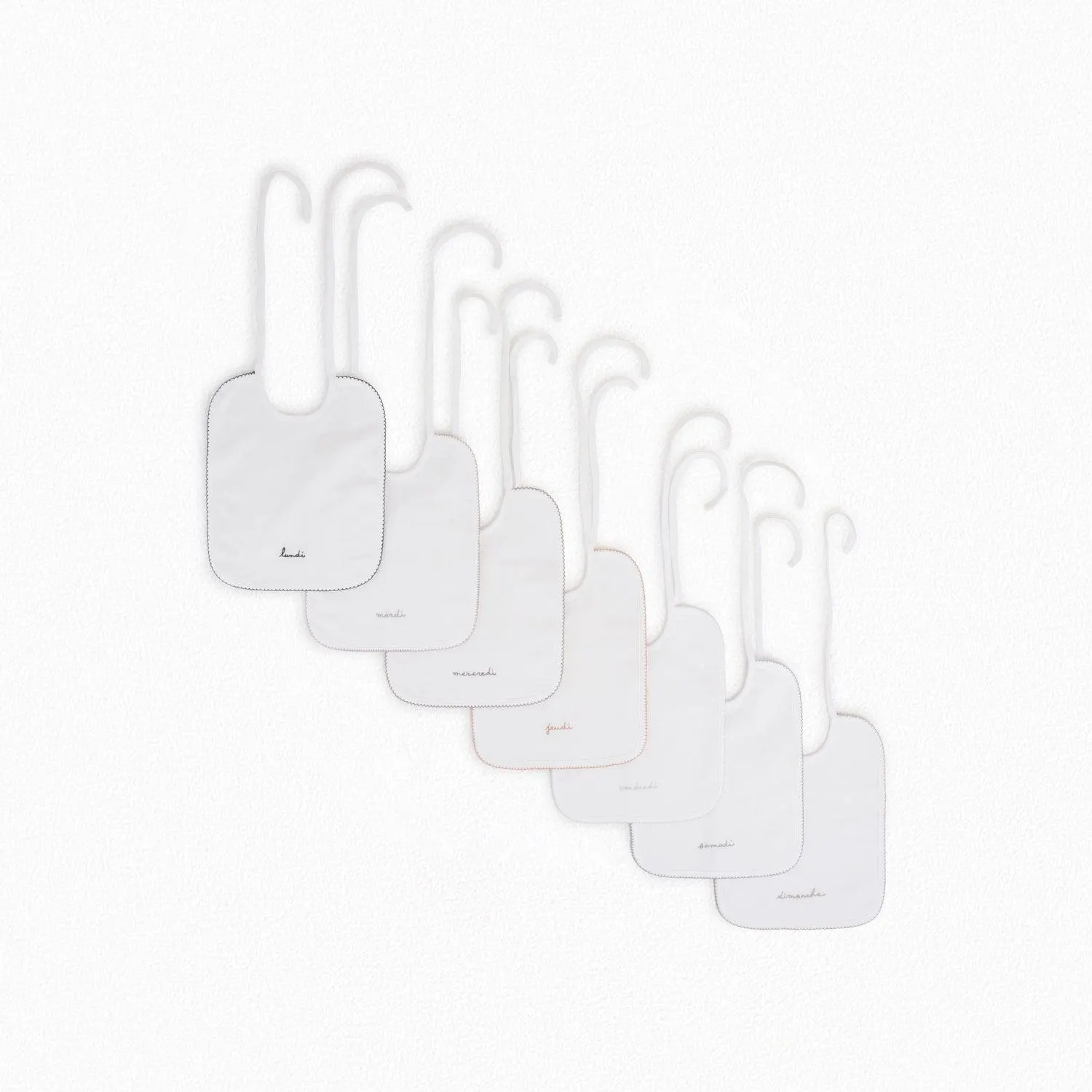 Lot de bavoirs brodés blanc