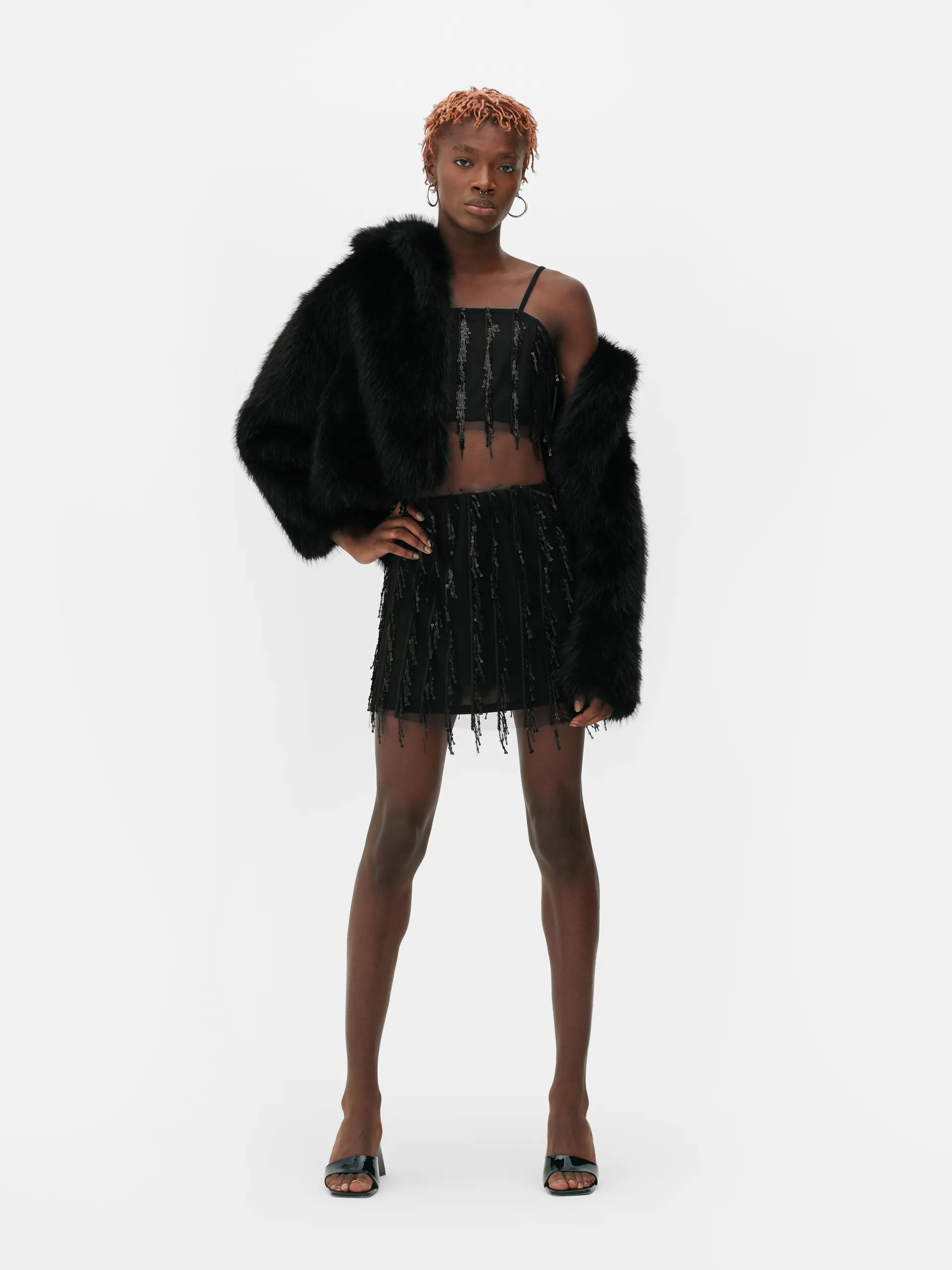 Gonna con frange e paillettes