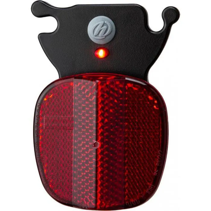 Takaheijastin valolla istuimeen