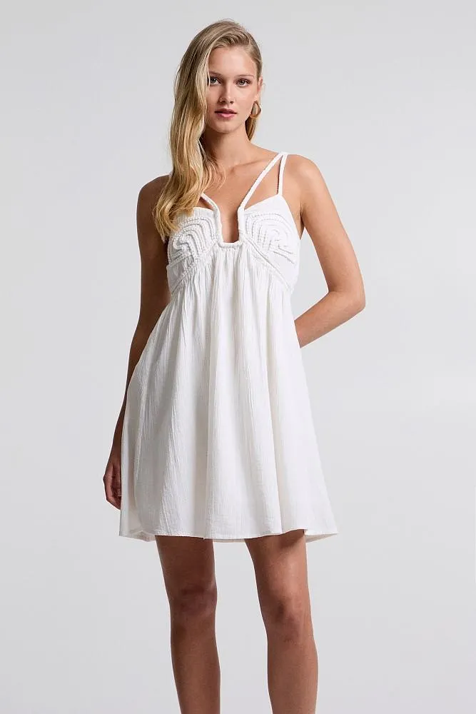 Dress with broderie on the bustier