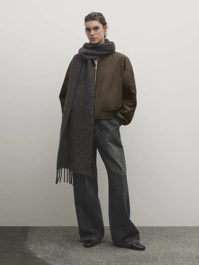 Reversible bomber jacket with toiletry-bag