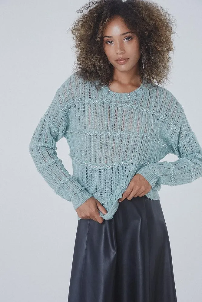 Sweater with loose knit