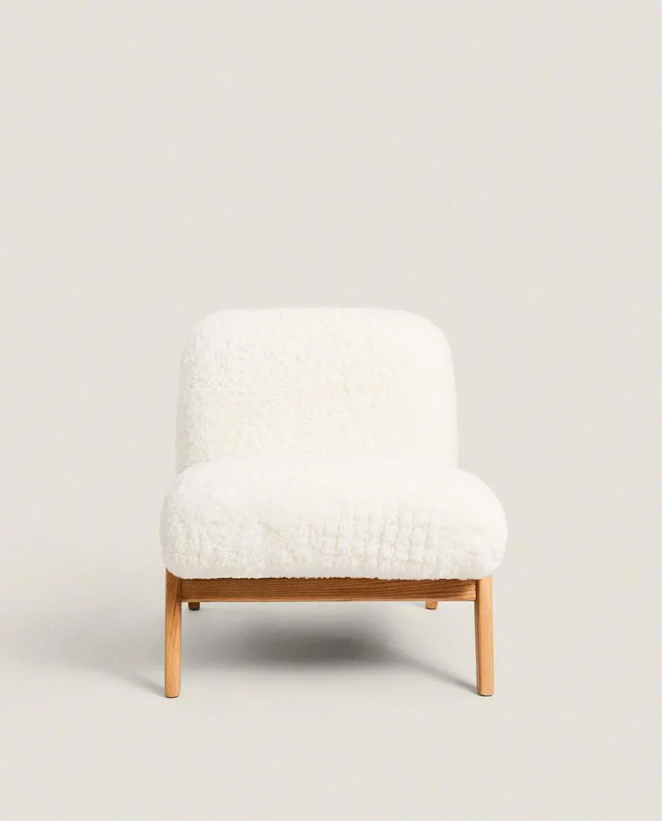 UPHOLSTERED FAUX FUR ARMCHAIR