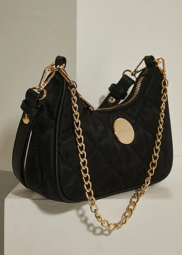 Μίνι καπιτονέ τσάντα από αδιάβροχο υλικό