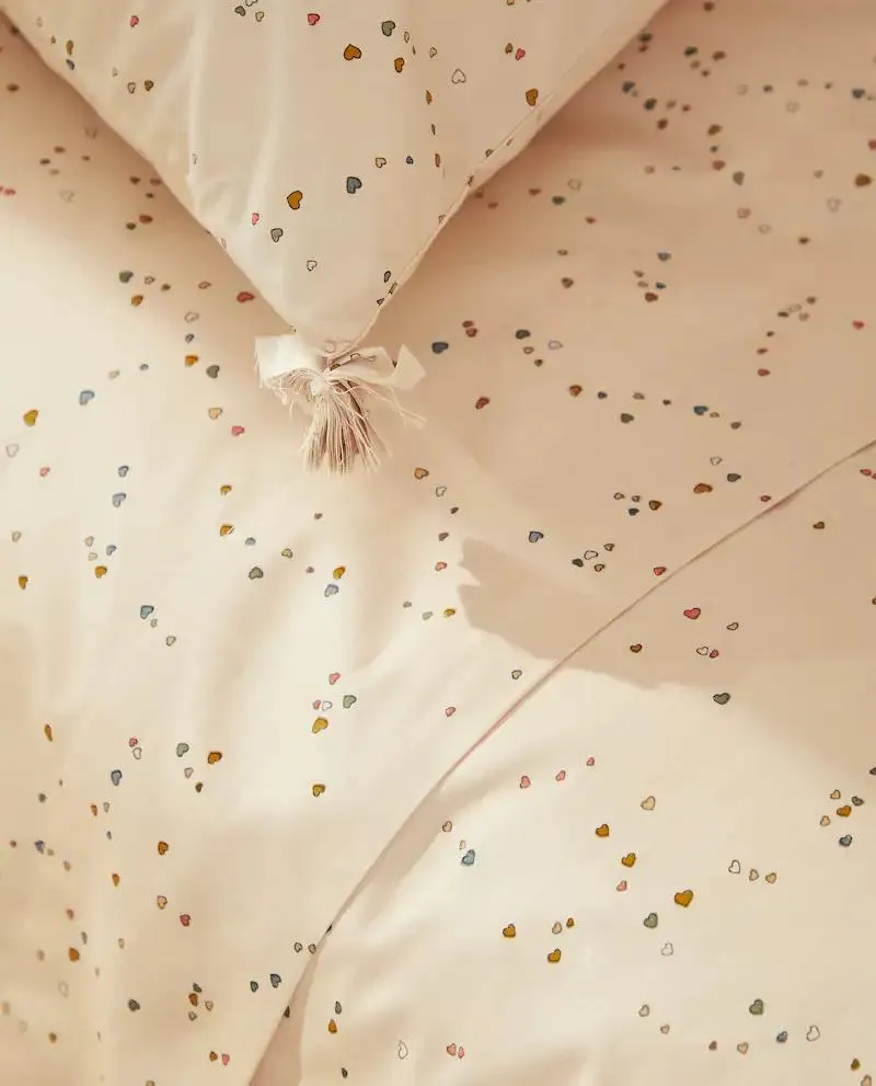 SÁBANA ENCIMERA INFANTIL CORAZONES MULTICOLOR