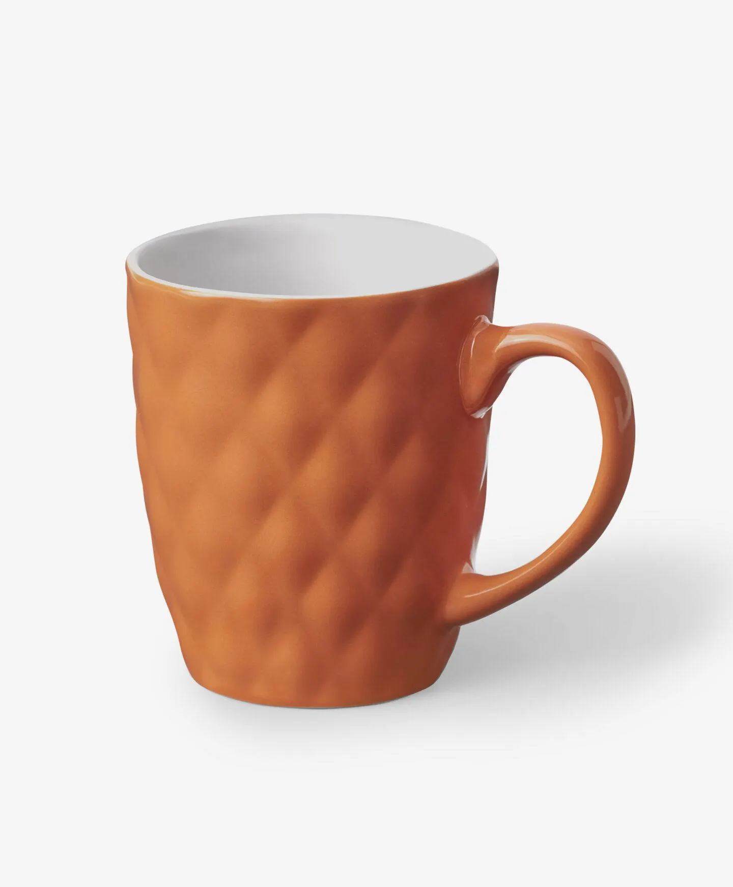 narancssárga dombornyomott bögre