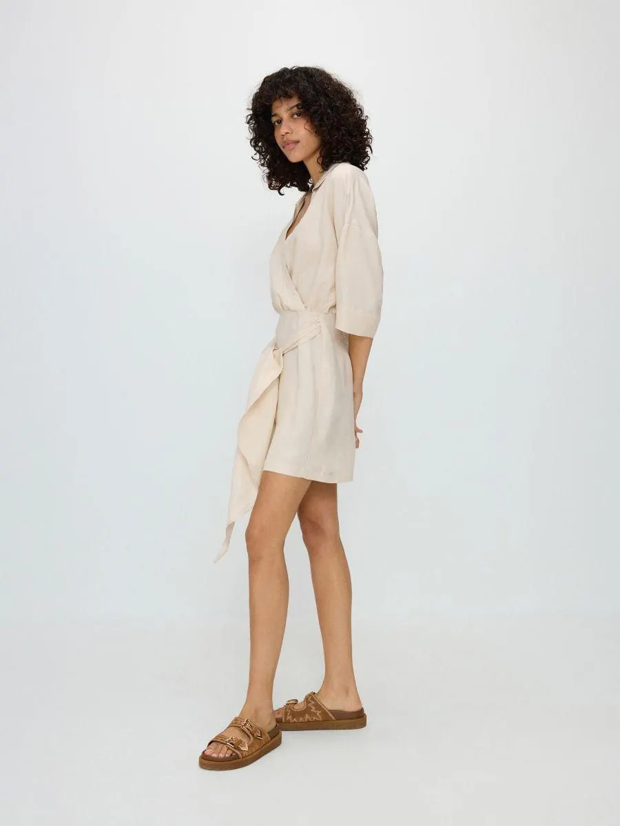 Átlapolt kezeslábas