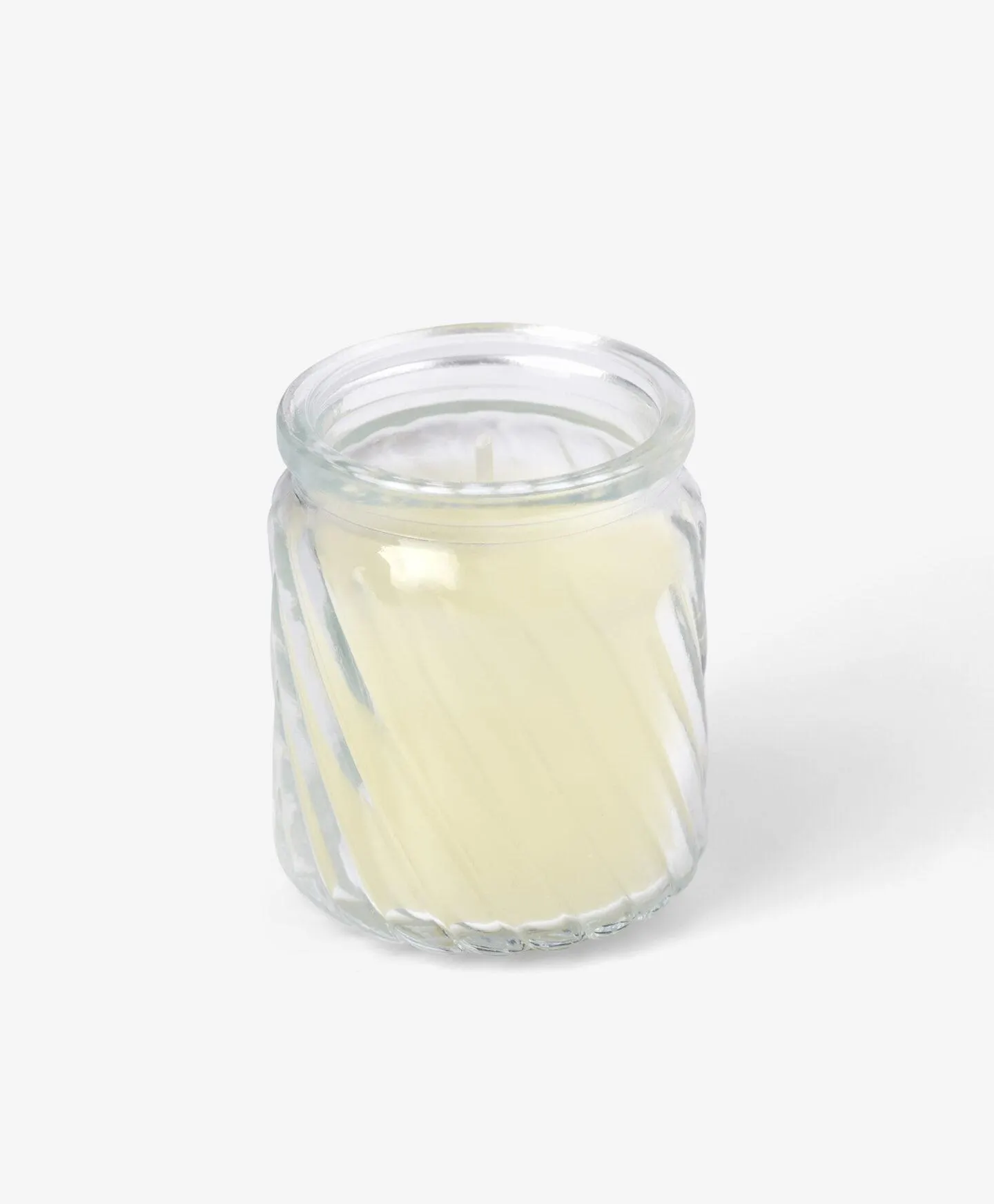 fehér gyertya üvegben