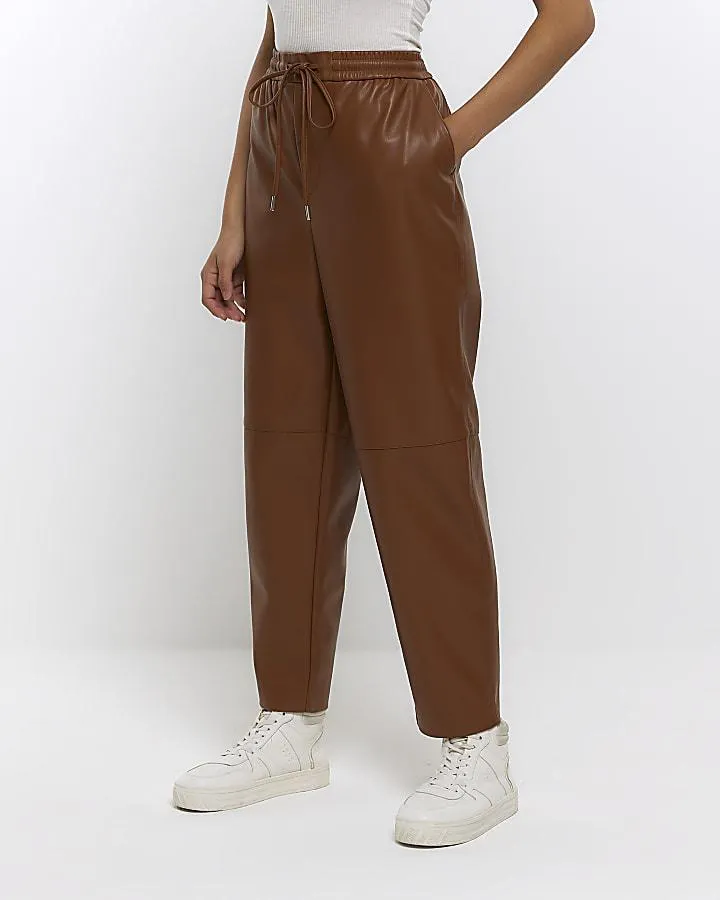 Brown faux leather seam detail trousers
