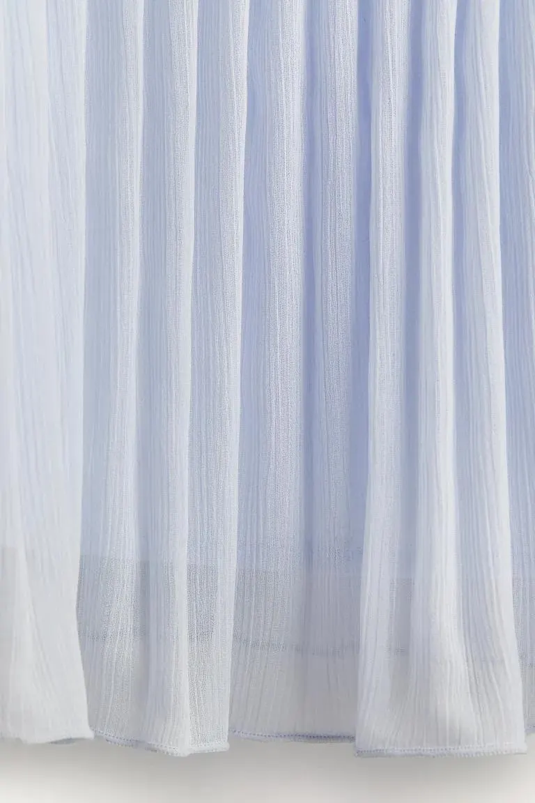 Sleeveless plissé dress