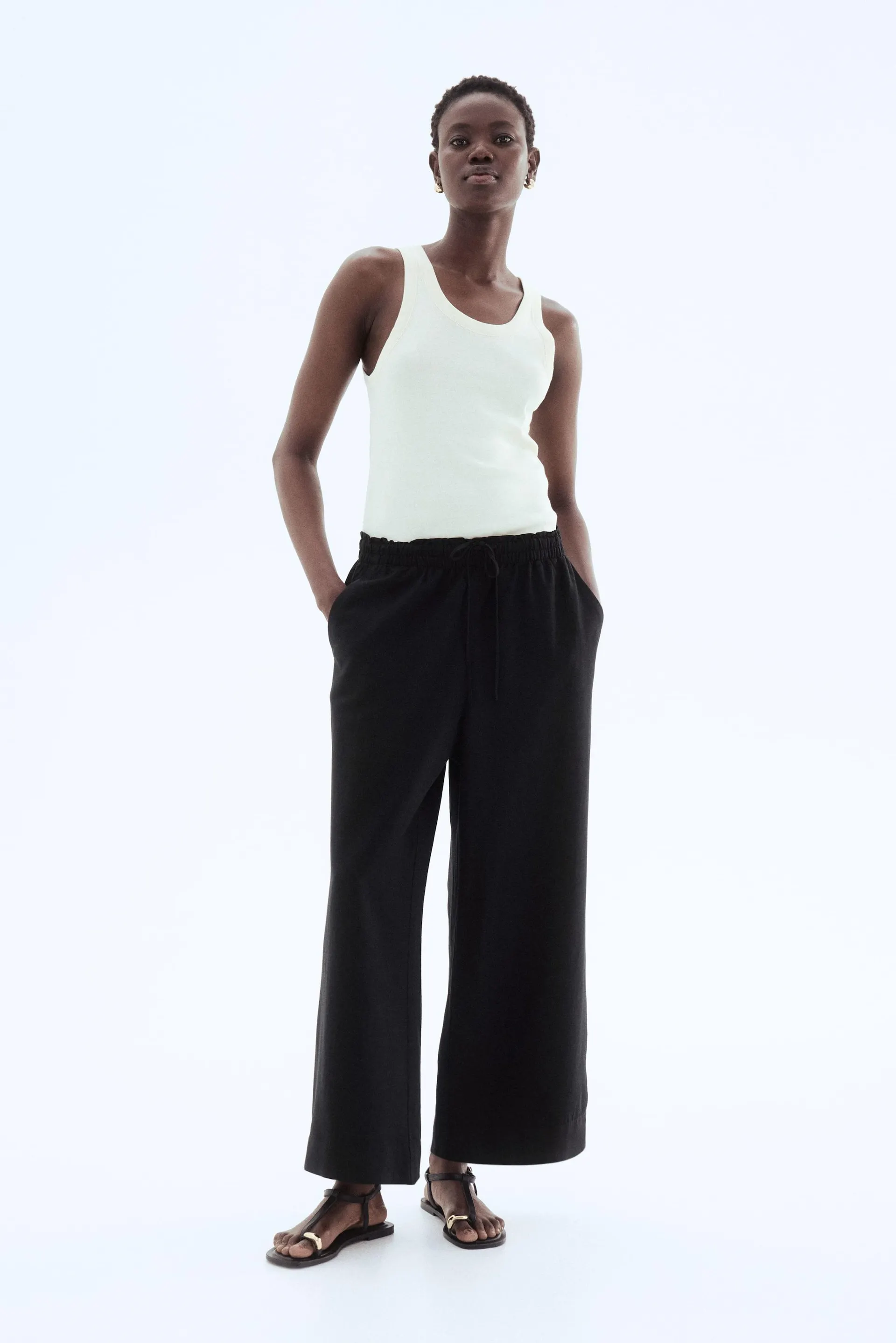 Cropped linen-blend trousers