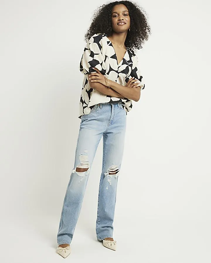 Blue high waisted ripped stove straight jeans