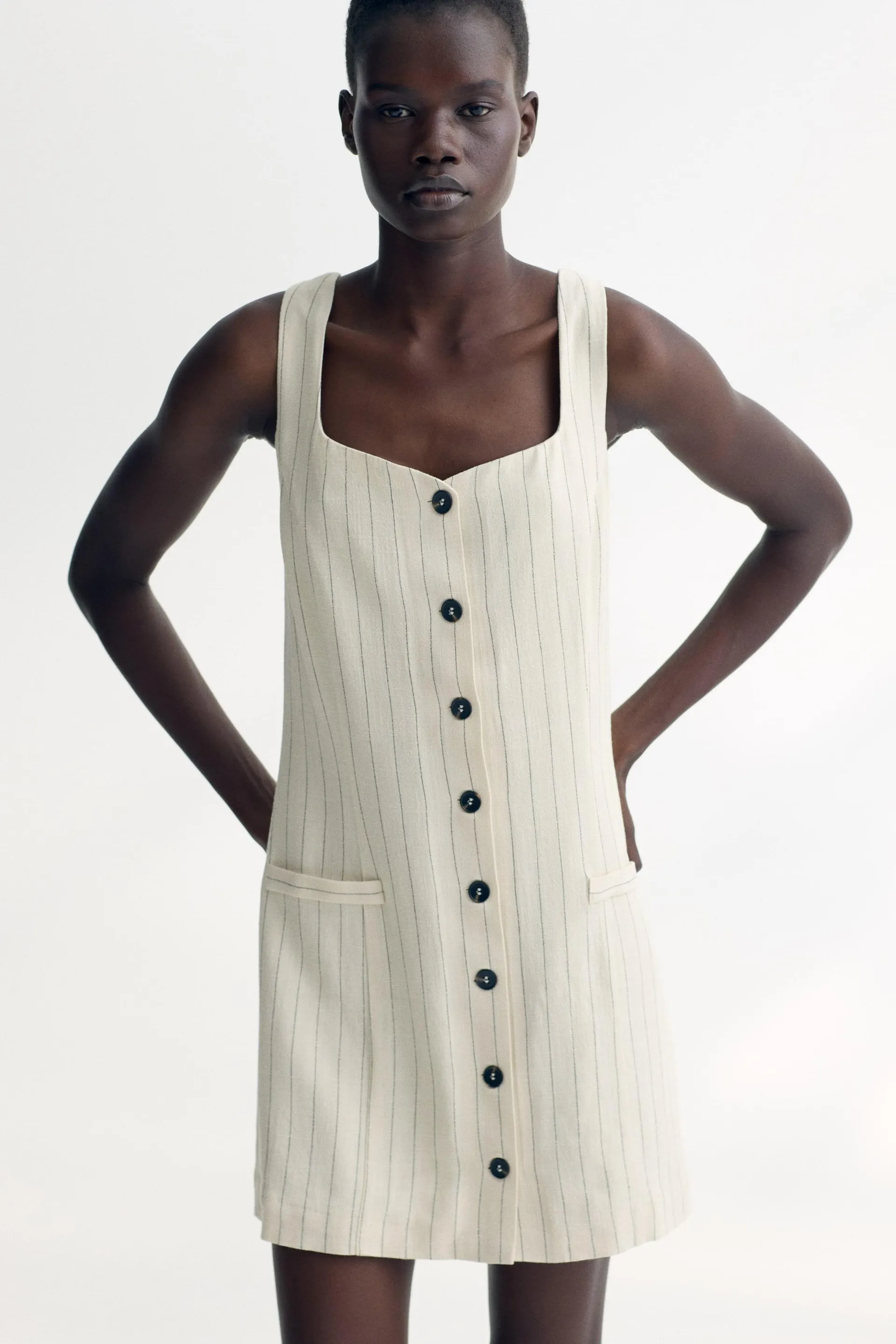 Sleeveless linen-blend dress