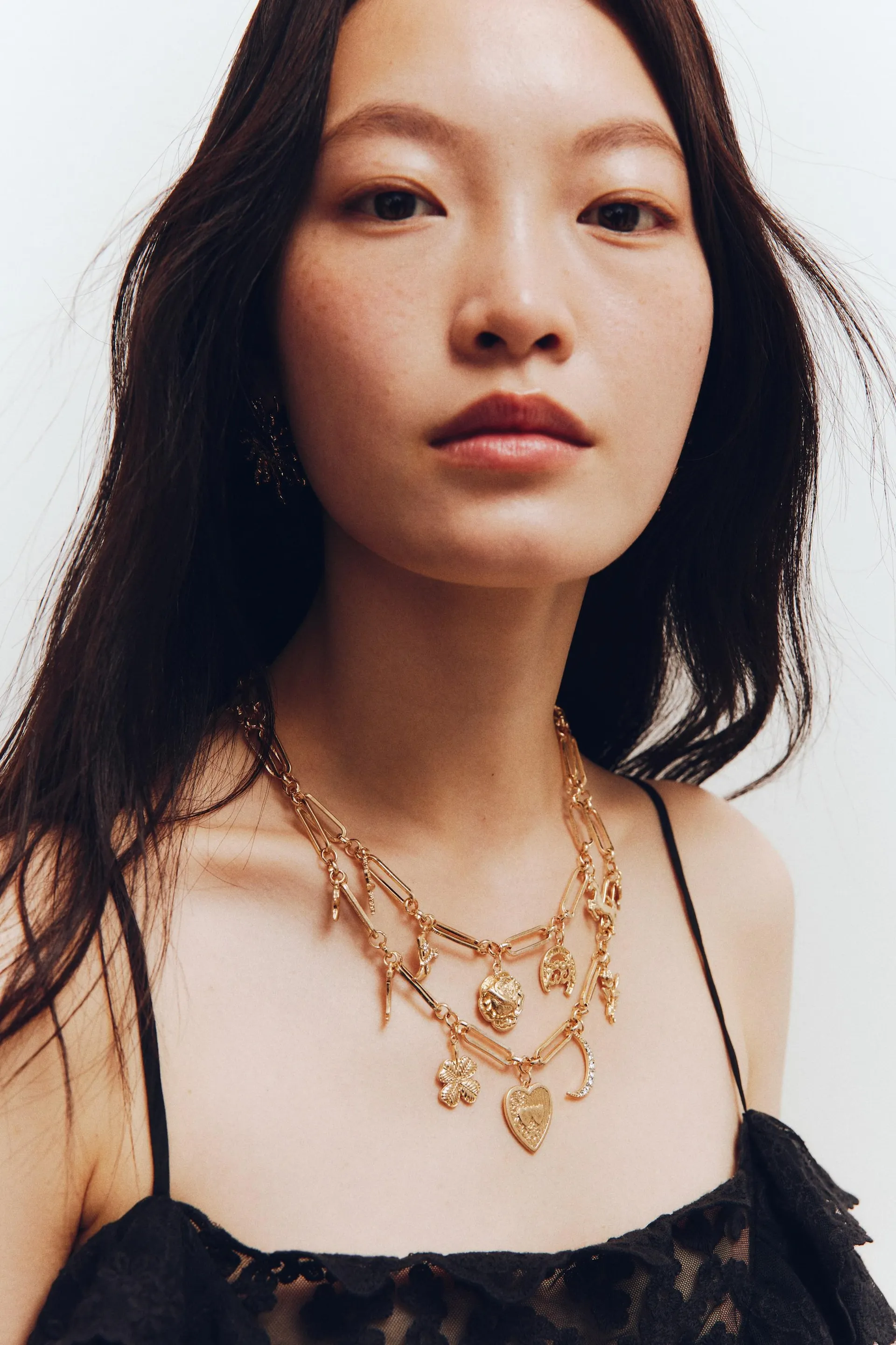 Two-strand charm necklace