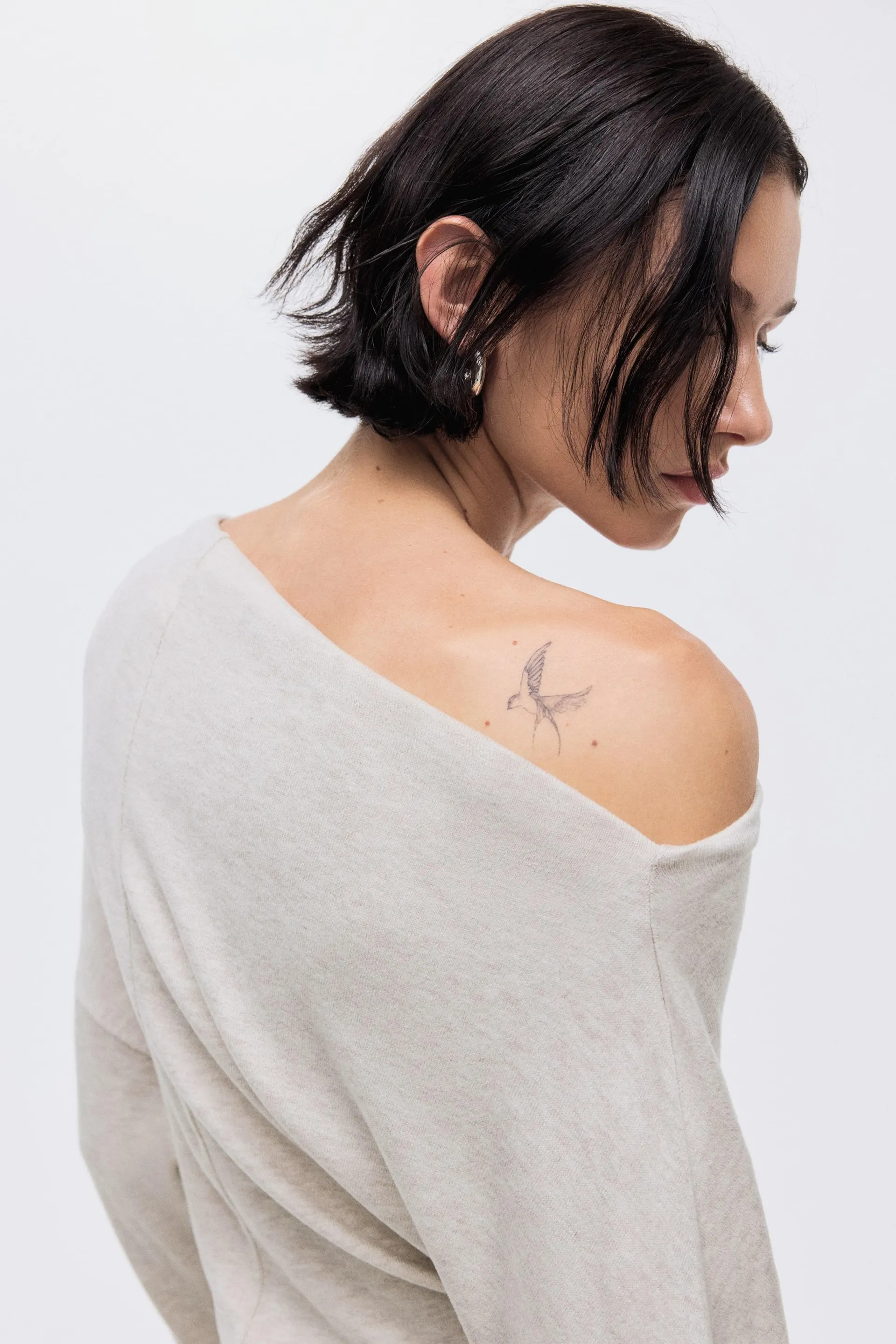 Asymmetric jersey top