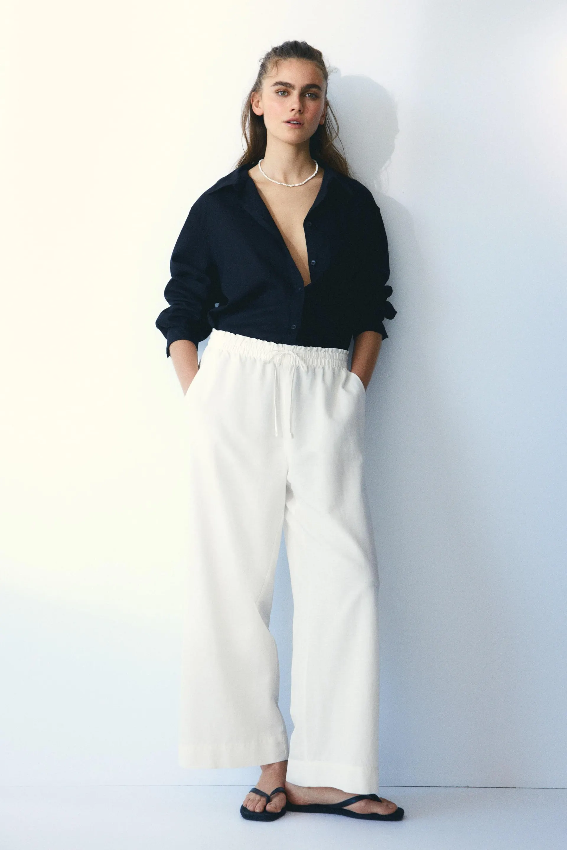Cropped linen-blend trousers