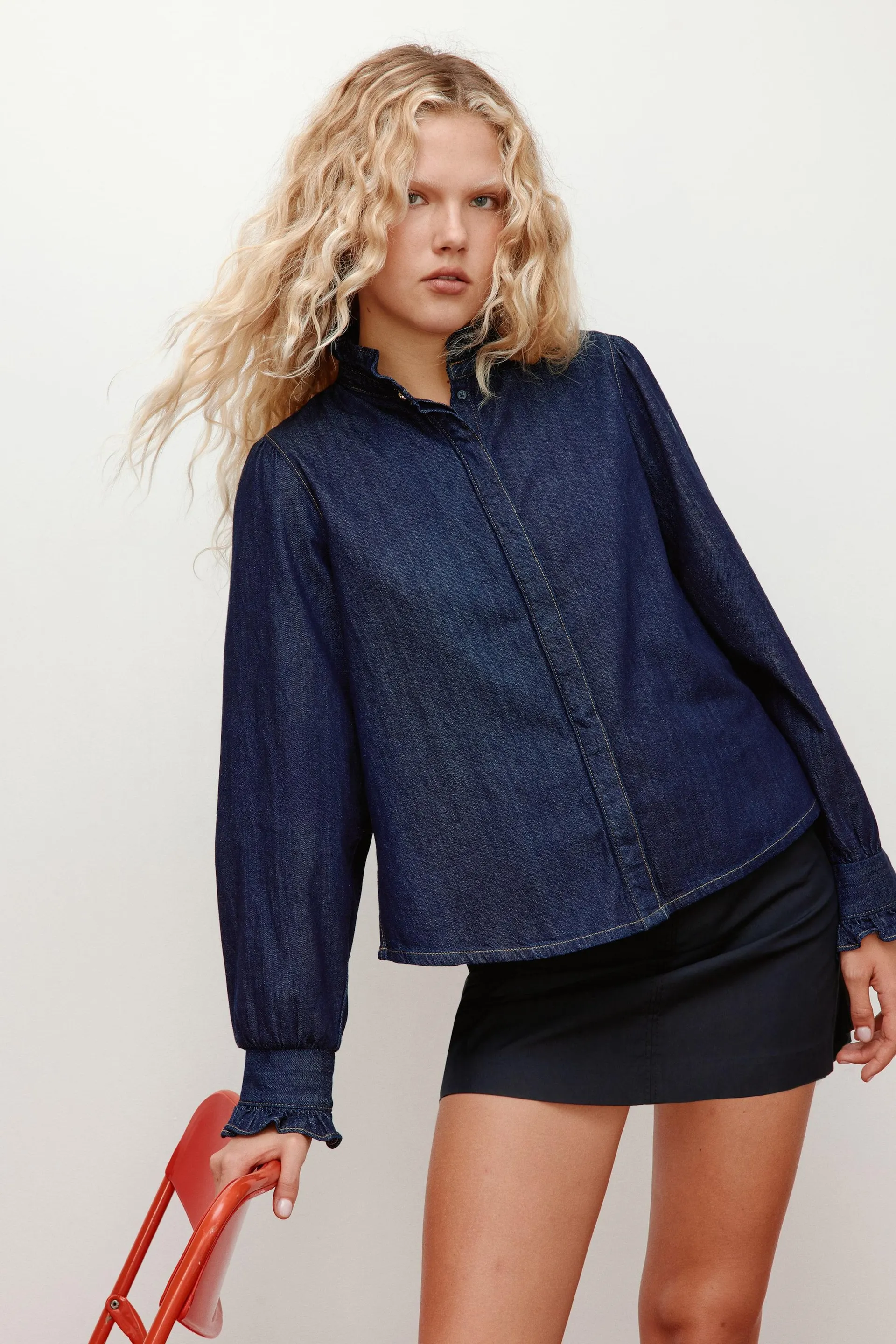 Frill-trimmed denim blouse