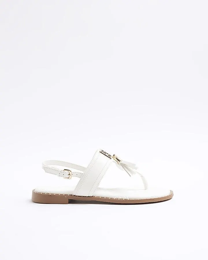 White tassel flat sandals