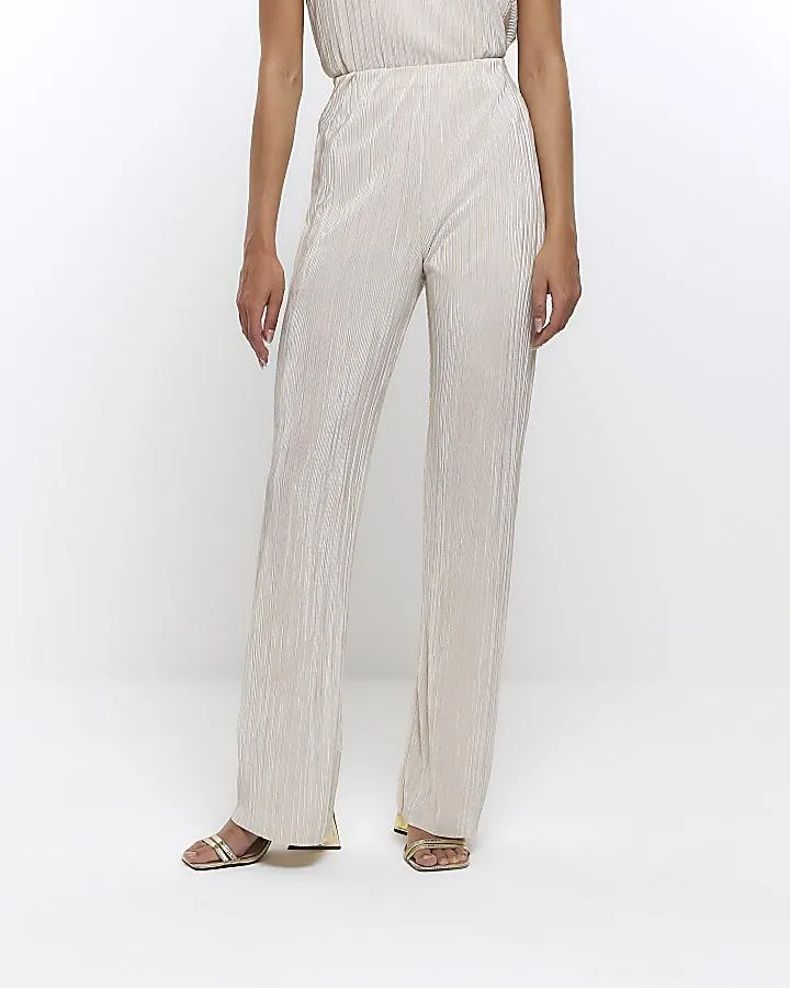 Cream plisse flared trousers