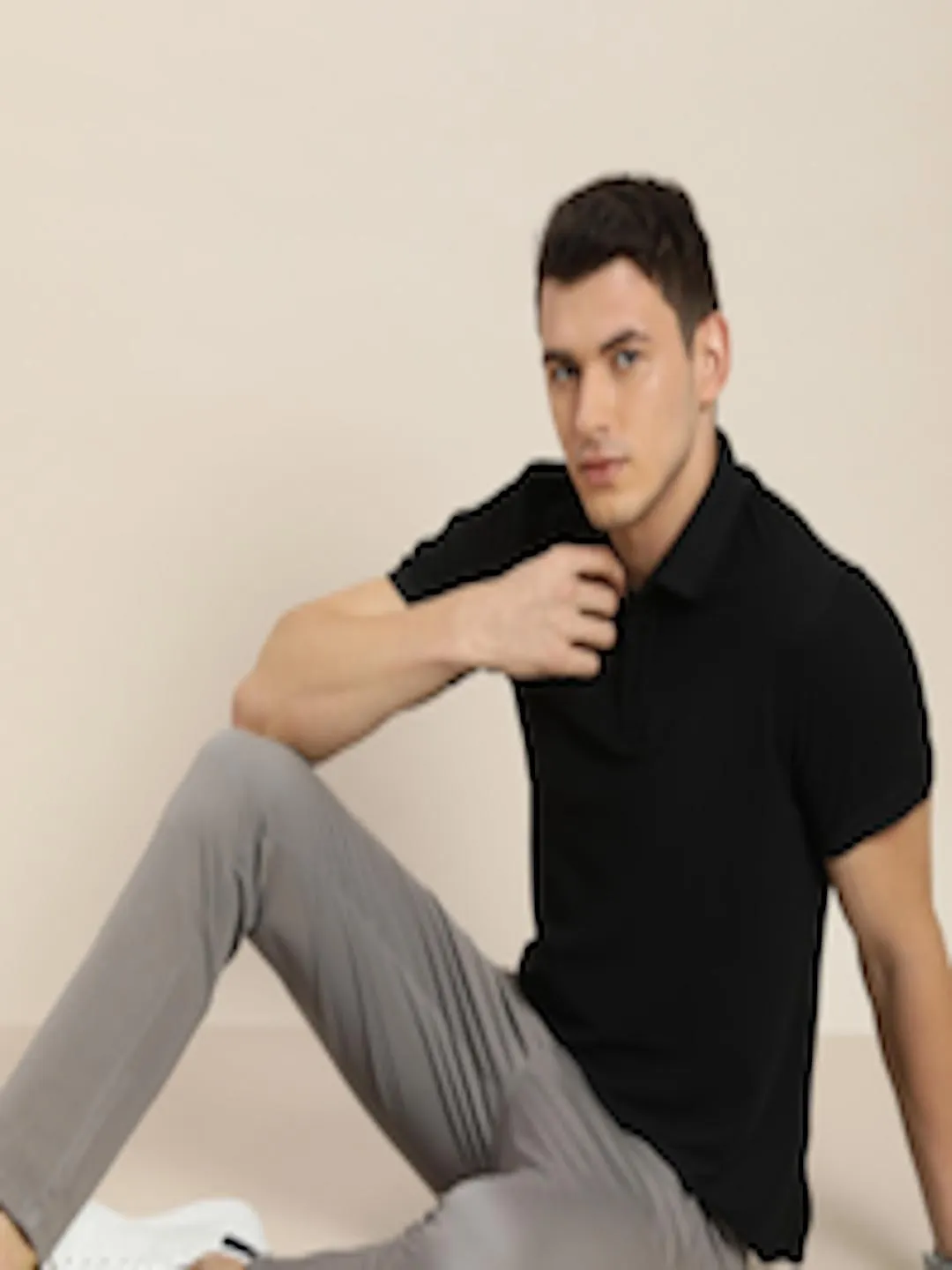 Men Black Solid Moisture-Wicking Antimicrobial Polo