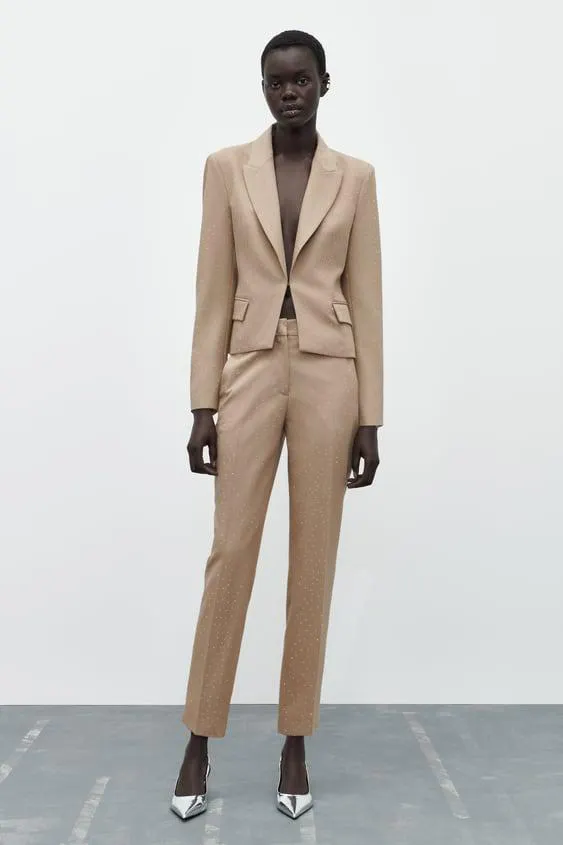 PANTALONI ALLA CAVIGLIA CON BRILLANTINI