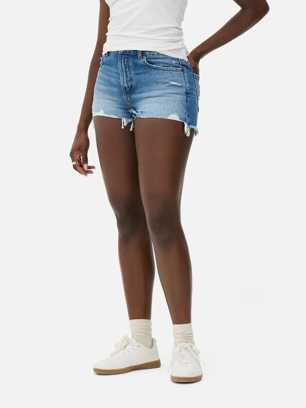 Pantalones cortos vaqueros rasgados