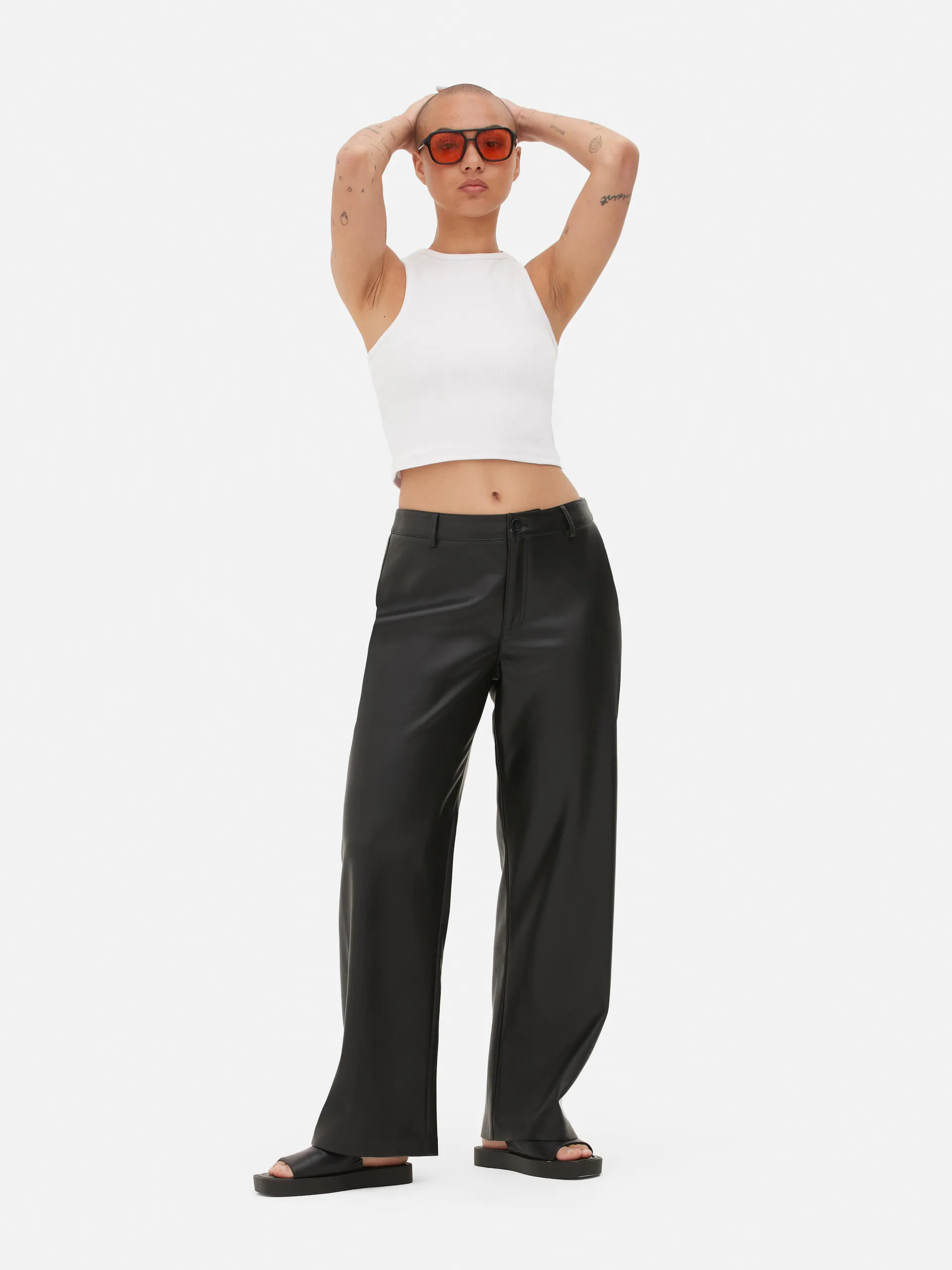 Pantaloni a gamba larga in pelle sintetica