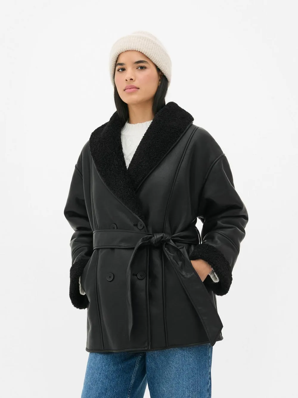 Giacca in pelle sintetica con cintura