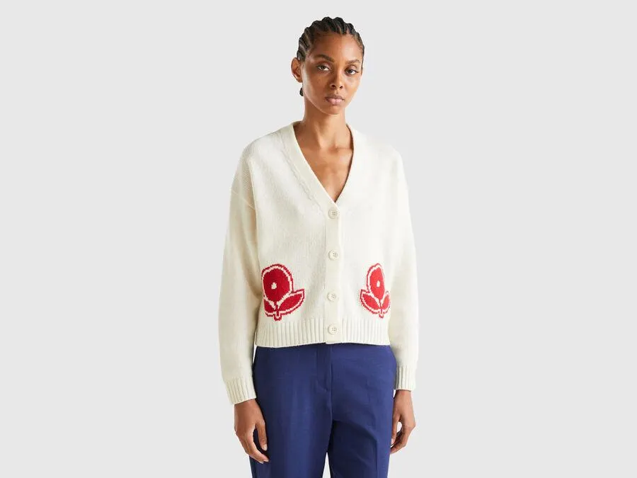 Cardigan con intarsi floreali