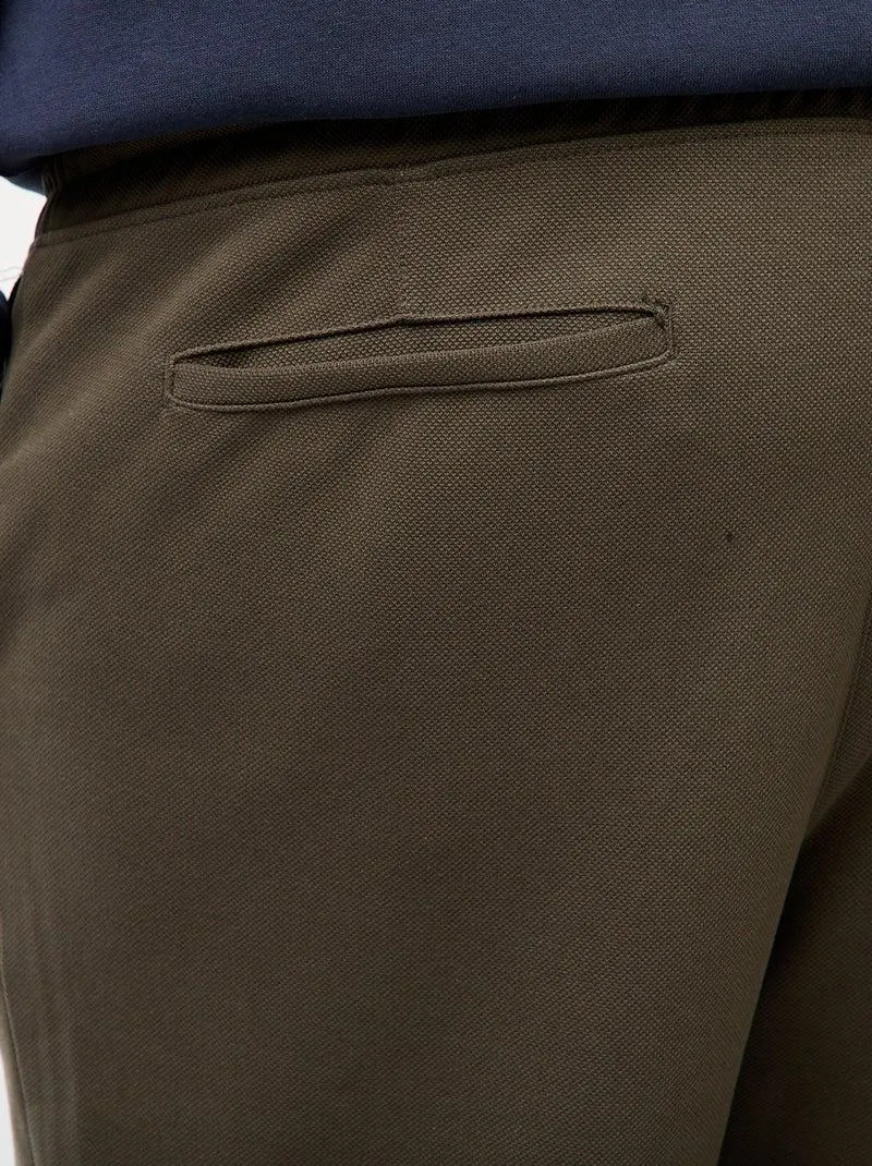 Joggers tinta unita in maglia piqué - Kaki