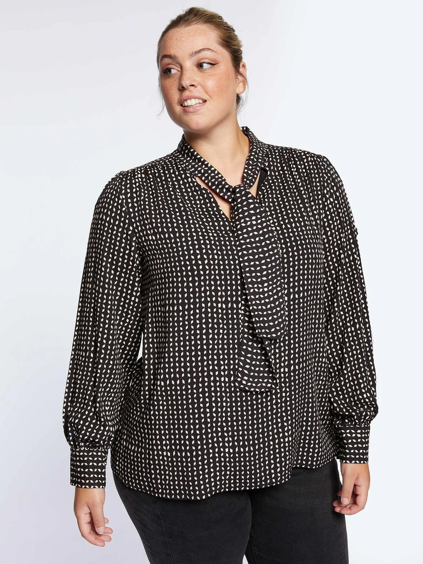 Blusa optical con fusciacca