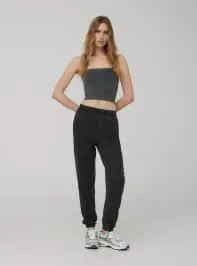 Pantaloni tuta garment-dyed a vita alta con polsini Nero