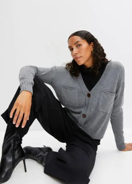 Cardigan corto con tasche grandi