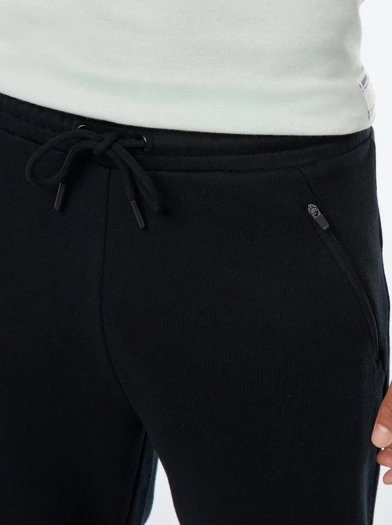 Joggers in felpa leggera con tasche zippate - Nero