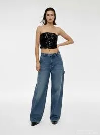 Top a fascia con paillettes Nero