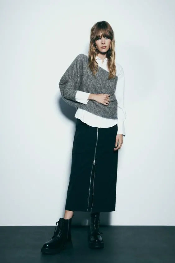 MANTELLA COPRISPALLE IN MAGLIA ASIMMETRICA