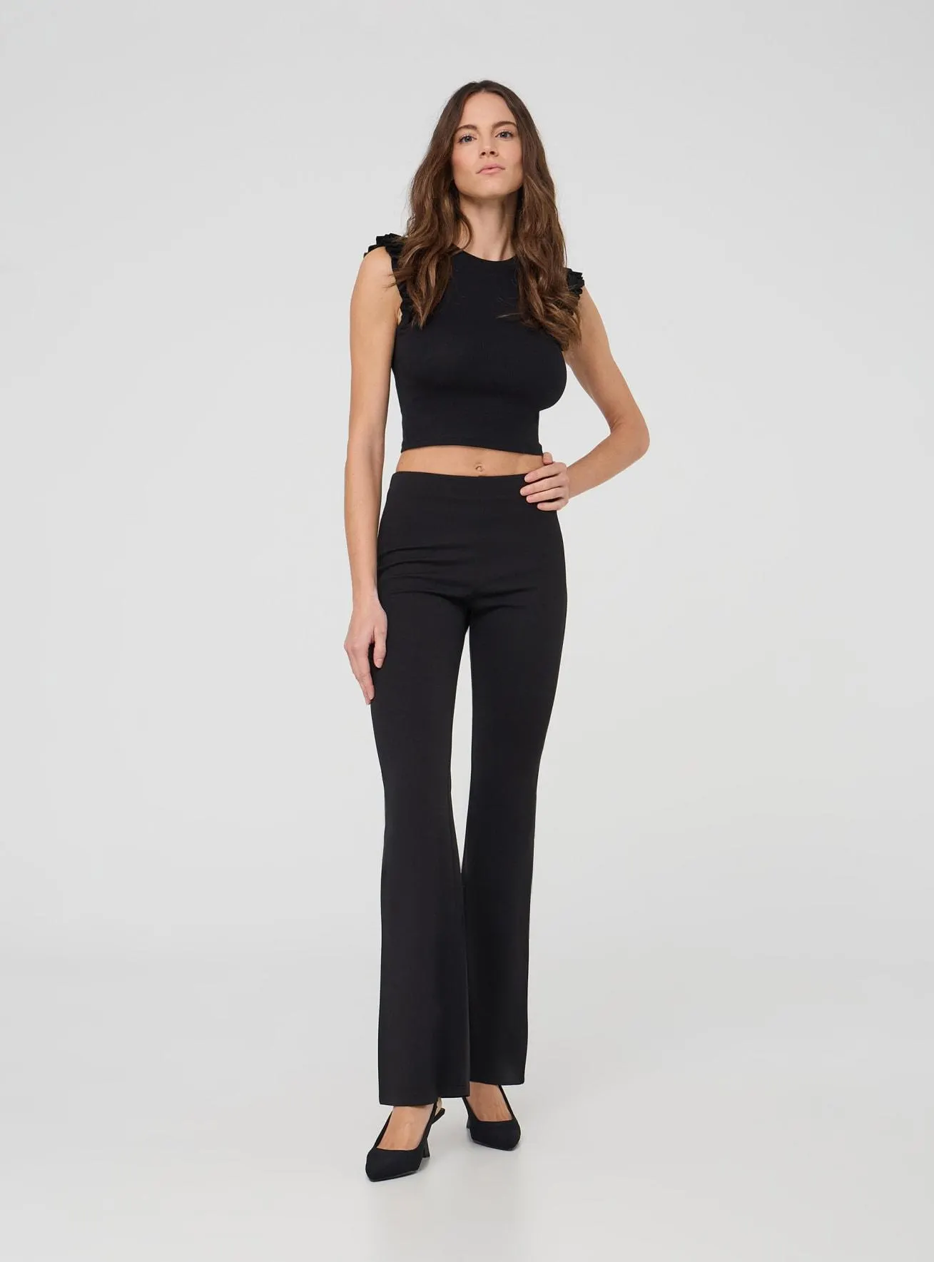 Pantaloni a zampa elasticizzati a tinta unita Nero